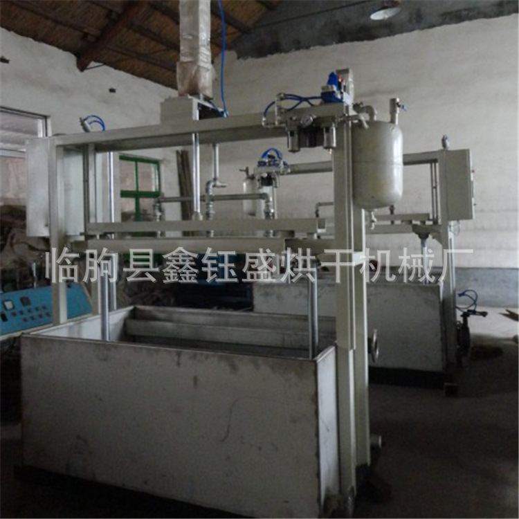 一种纸浆模塑产品切边机全自动上料设备的制作方法_2